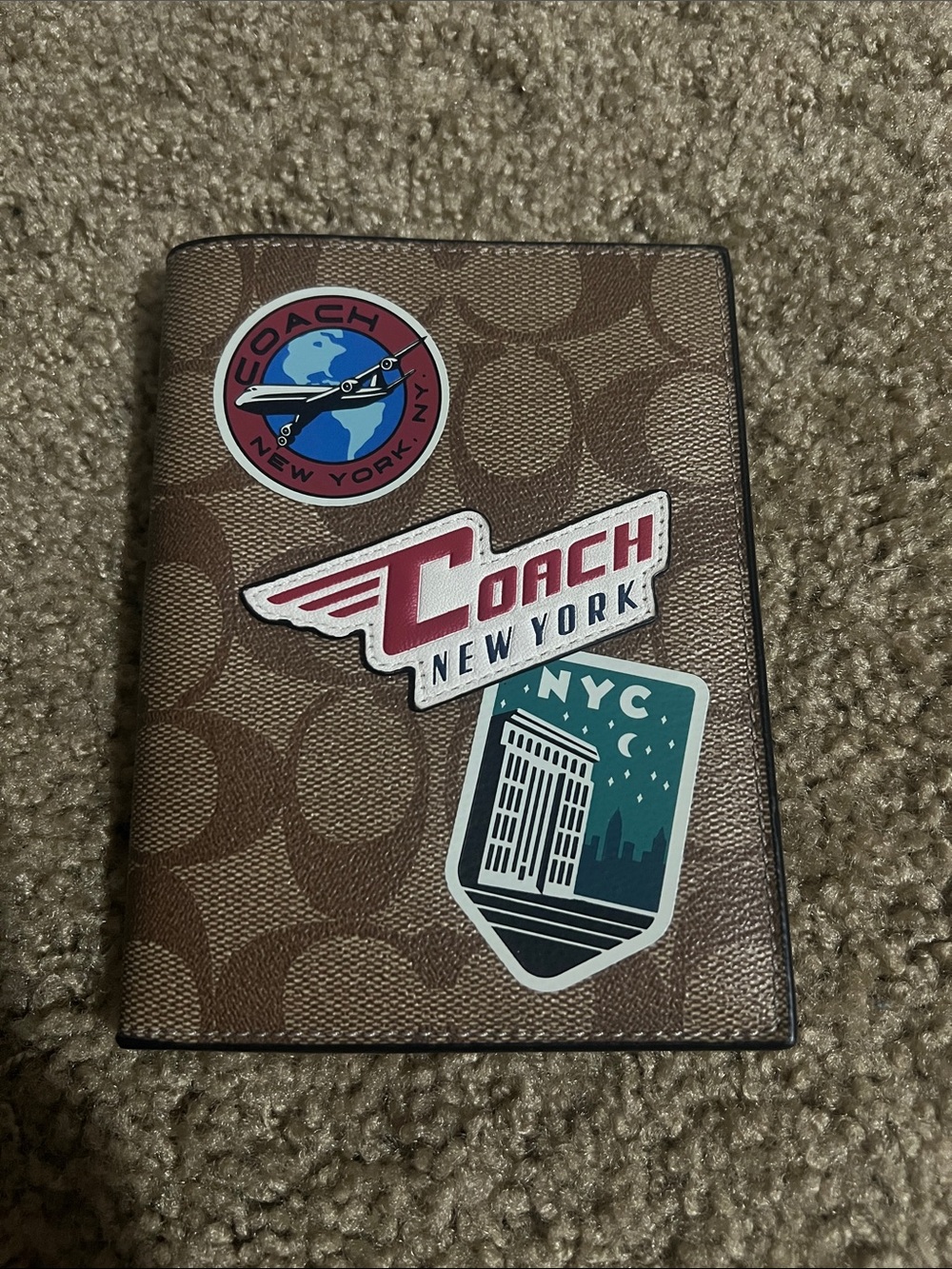 Coach Brown Signature Passport/Card Holder with Colorful NYC Stickers